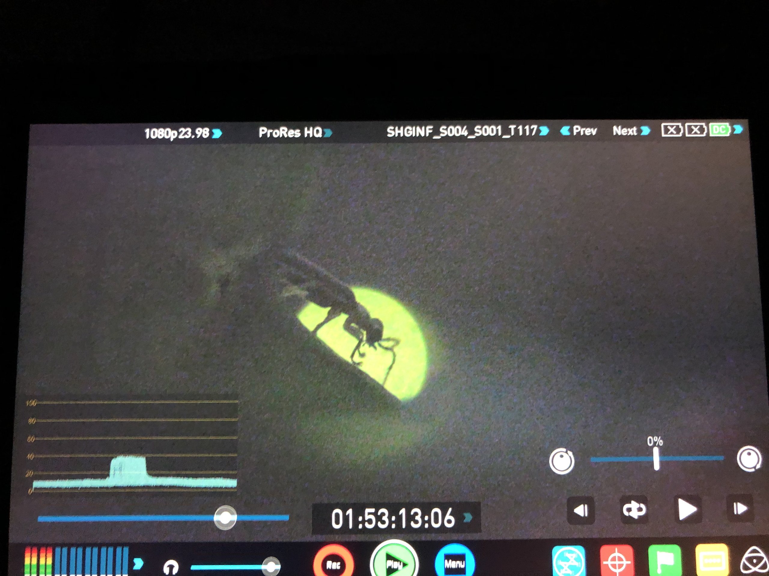 Reviewing night-filmed footage on location for Earth at Night in Color